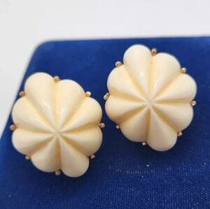 Vintage Signed MANDLE Cream Resin Carved Domed Floral Clip On Earrings
